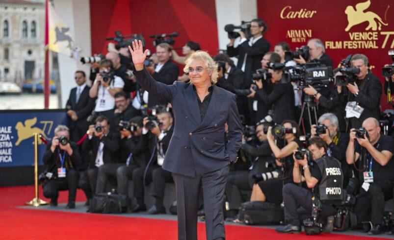 Flavio Briatore waving on red carpet at 66th Venice Film Festival 2009 - Flavio Briatore billionaire brand Italian luxury
